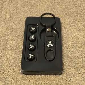 Mitsubishi Black & Silver Car Tire Valve Caps and Keychain Set